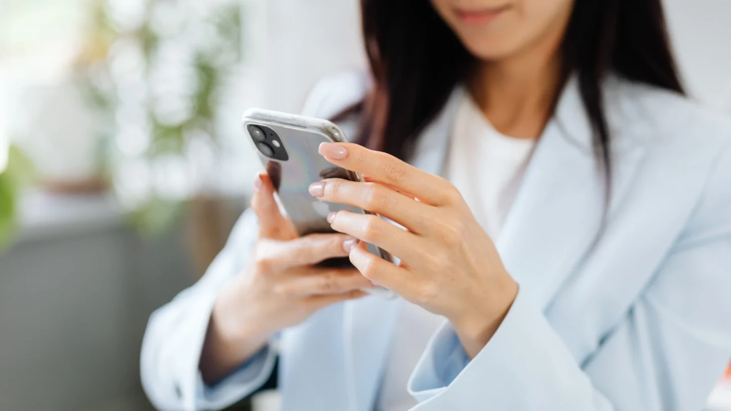 Business woman using smartphone