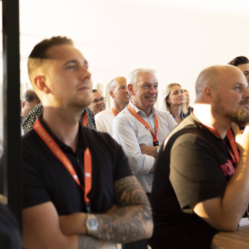A group listening to a presentation